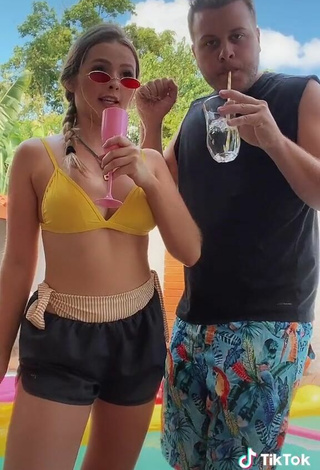 5. Sexy Morgana Santana Shows Cleavage in Yellow Bikini Top