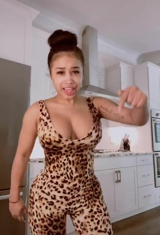 3. Beautiful DreamDoll Shows Cleavage in Sexy Leopard Bodysuit