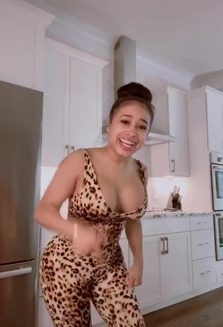 5. Beautiful DreamDoll Shows Cleavage in Sexy Leopard Bodysuit
