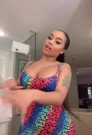 Sexy DreamDoll Shows Cleavage in Leopard Bodysuit