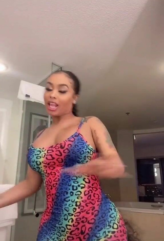 5. Sexy DreamDoll Shows Cleavage in Leopard Bodysuit