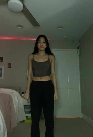 6. Sexy Ashley Trinh Shows Cleavage in Brown Crop Top