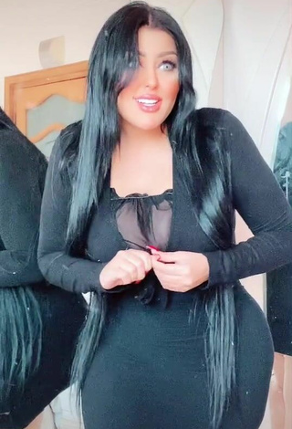 6. Sexy Salma Elshimy Shows Cleavage in Black Dress