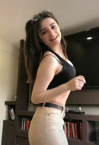 2. Sweetie Sandy Shows Cleavage in Black Crop Top