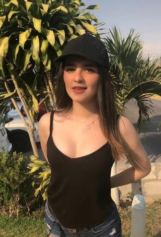 Hot Sandy Shows Cleavage in Black Tank Top