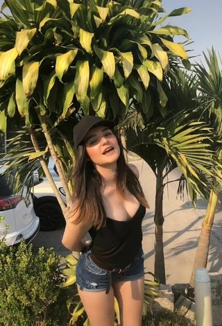 Sexy Sandy Shows Cleavage in Black Tank Top