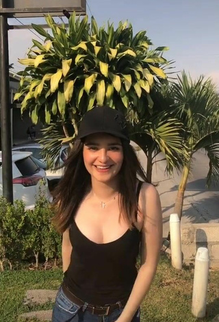 4. Sexy Sandy Shows Cleavage in Black Tank Top