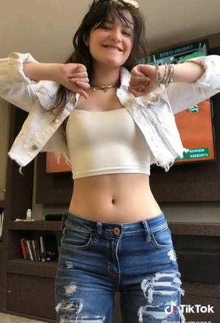 6. Sexy Sandy Shows Cleavage in White Crop Top while doing Belly Dance