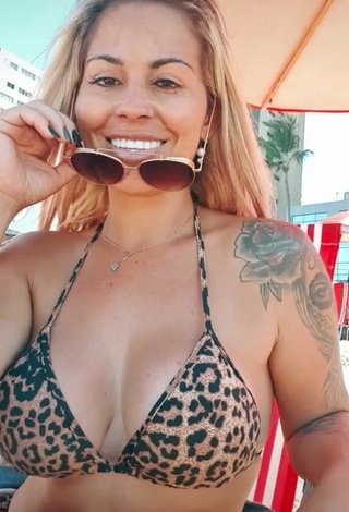 3. Sexy Sheila Bellaver Shows Cleavage in Leopard Bikini Top