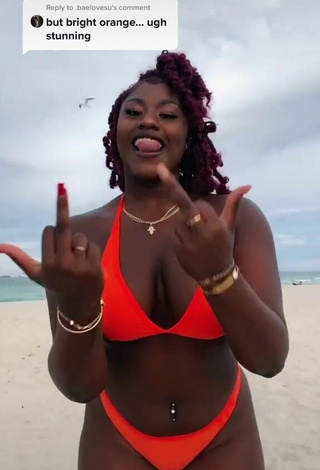 Magnificent Skaibeauty Shows Cleavage in Electric Orange Bikini and Bouncing Breasts at the Beach