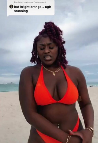2. Magnificent Skaibeauty Shows Cleavage in Electric Orange Bikini and Bouncing Breasts at the Beach