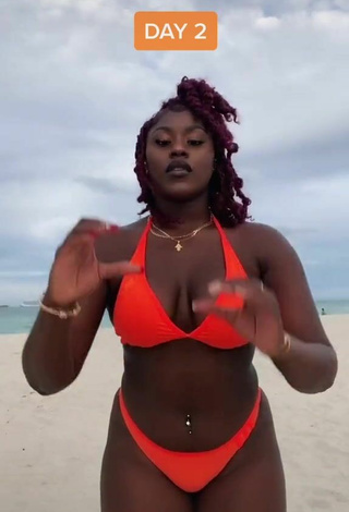 2. Dazzling Skaibeauty Shows Cleavage in Inviting Electric Orange Bikini and Bouncing Boobs at the Beach