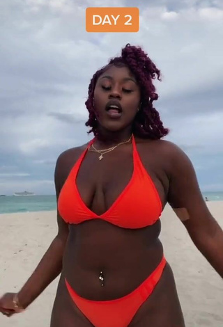 3. Dazzling Skaibeauty Shows Cleavage in Inviting Electric Orange Bikini and Bouncing Boobs at the Beach