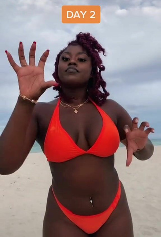 4. Dazzling Skaibeauty Shows Cleavage in Inviting Electric Orange Bikini and Bouncing Boobs at the Beach