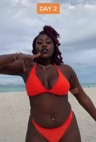 5. Dazzling Skaibeauty Shows Cleavage in Inviting Electric Orange Bikini and Bouncing Boobs at the Beach