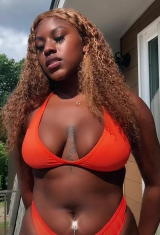 1. Hot Skaibeauty Shows Cleavage in Orange Bikini