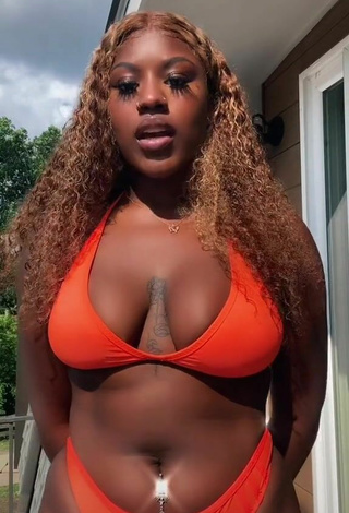 2. Hot Skaibeauty Shows Cleavage in Orange Bikini
