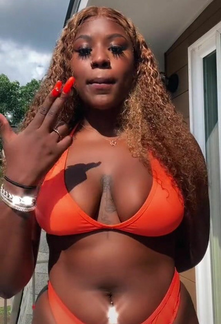 4. Hot Skaibeauty Shows Cleavage in Orange Bikini