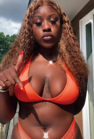 6. Hot Skaibeauty Shows Cleavage in Orange Bikini