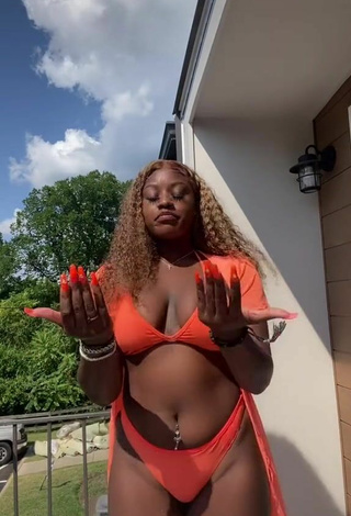 4. Sexy Skaibeauty Shows Cleavage in Orange Bikini