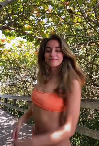 4. Sexy Léa Martinez Shows Cleavage in Orange Bikini