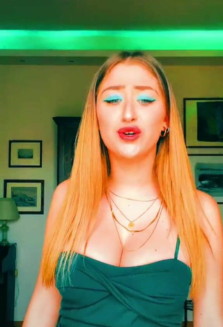 1. Cute Sofia Sembiante Shows Cleavage in Green Dress and Bouncing Boobs