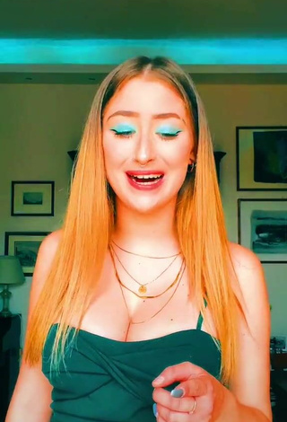 2. Cute Sofia Sembiante Shows Cleavage in Green Dress and Bouncing Boobs