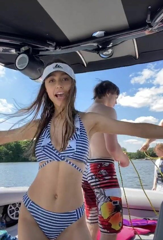 Hot Sydney Serena Shows Cleavage in Striped Bikini in the Sea