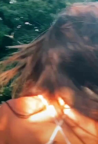 6. Sexy Bella Kellis Shows Cleavage in Bikini Top
