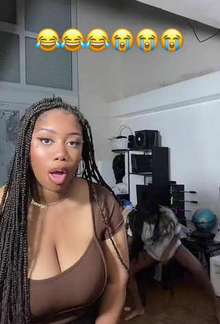 2. Sexy lauryn Shows Cleavage in Brown Crop Top