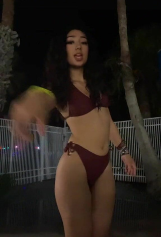 4. Beautiful Valery Lopez Shows Cleavage in Sexy Purple Bikini