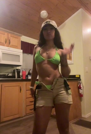 Cute Valery Lopez Shows Cleavage in Green Bikini