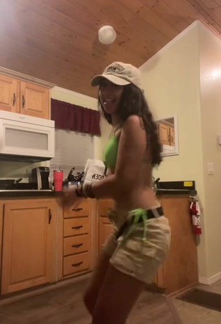 5. Cute Valery Lopez Shows Cleavage in Green Bikini
