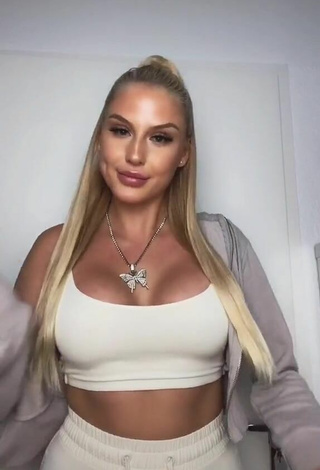 Antonia Rot shows Alluring White Crop Top and Cleavage