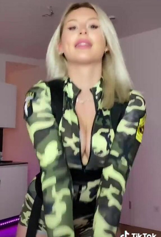 6. Sexy Antonia Rot Shows Cleavage in Camouflage Bodysuit