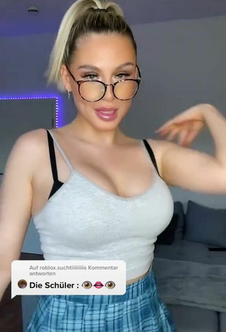 5. Antonia Rot Shows Cleavage in Seductive White Crop Top and Bouncing Boobs