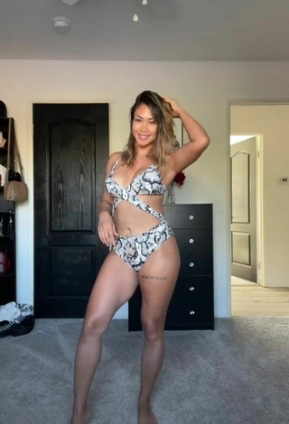 Sexy Atqofficial Shows Cleavage in Snake Print Swimsuit