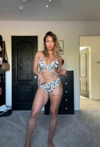 2. Sexy Atqofficial Shows Cleavage in Snake Print Swimsuit
