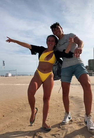 2. Sexy Celia Pergo Shows Cleavage in Yellow Bikini at the Beach