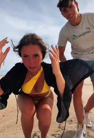4. Sexy Celia Pergo Shows Cleavage in Yellow Bikini at the Beach