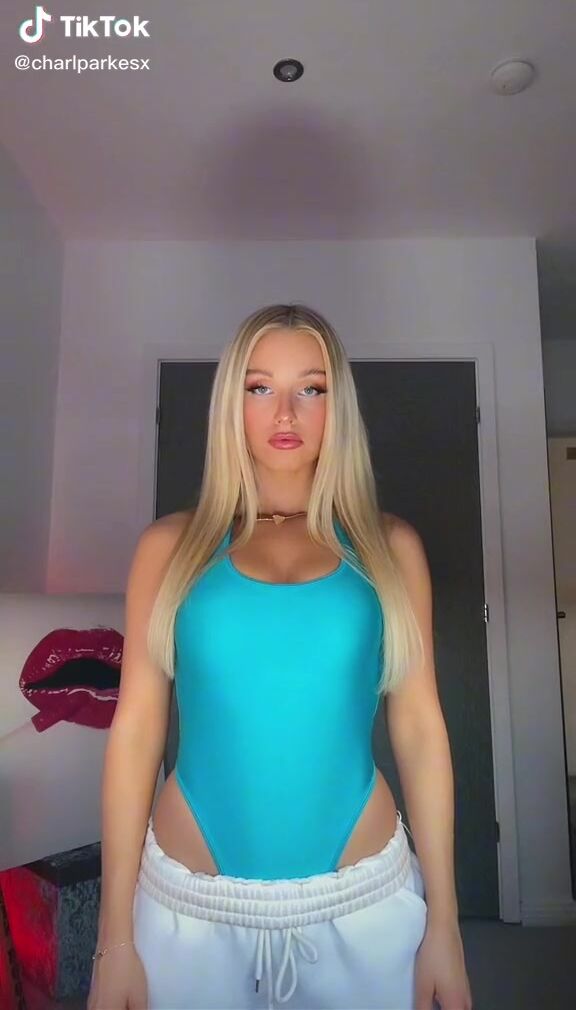 Hot Charlotte Parkes Shows Cleavage in Blue Bodysuit and Bouncing Tits