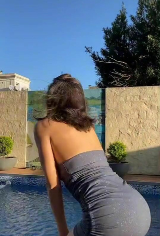 5. Sexy Dai Amadeo Shows Cleavage in Grey Dress at the Pool