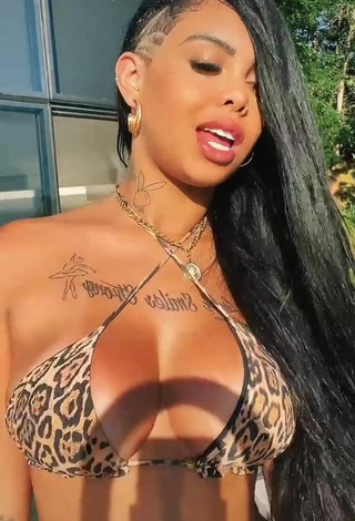 Erotic Nathi Rodrigues Shows Cleavage in Leopard Bikini Top