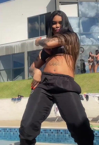 6. Hot Nathi Rodrigues Shows Cleavage in Black Bikini Top