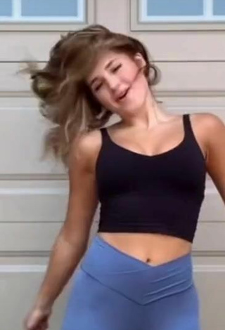 2. Hot Emerson Rock Shows Cleavage in Black Crop Top and Bouncing Boobs