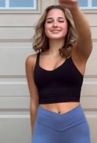 4. Hot Emerson Rock Shows Cleavage in Black Crop Top and Bouncing Boobs