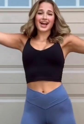 6. Hot Emerson Rock Shows Cleavage in Black Crop Top and Bouncing Boobs