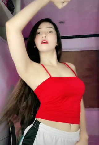 6. Amazing Eunice Andrea Shows Cleavage in Hot Red Crop Top