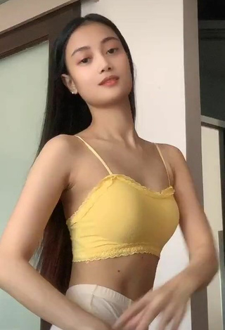 5. Seductive Gerlyn Severa Shows Cleavage in Yellow Crop Top
