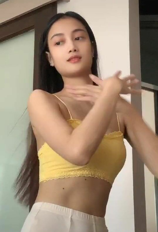 6. Seductive Gerlyn Severa Shows Cleavage in Yellow Crop Top